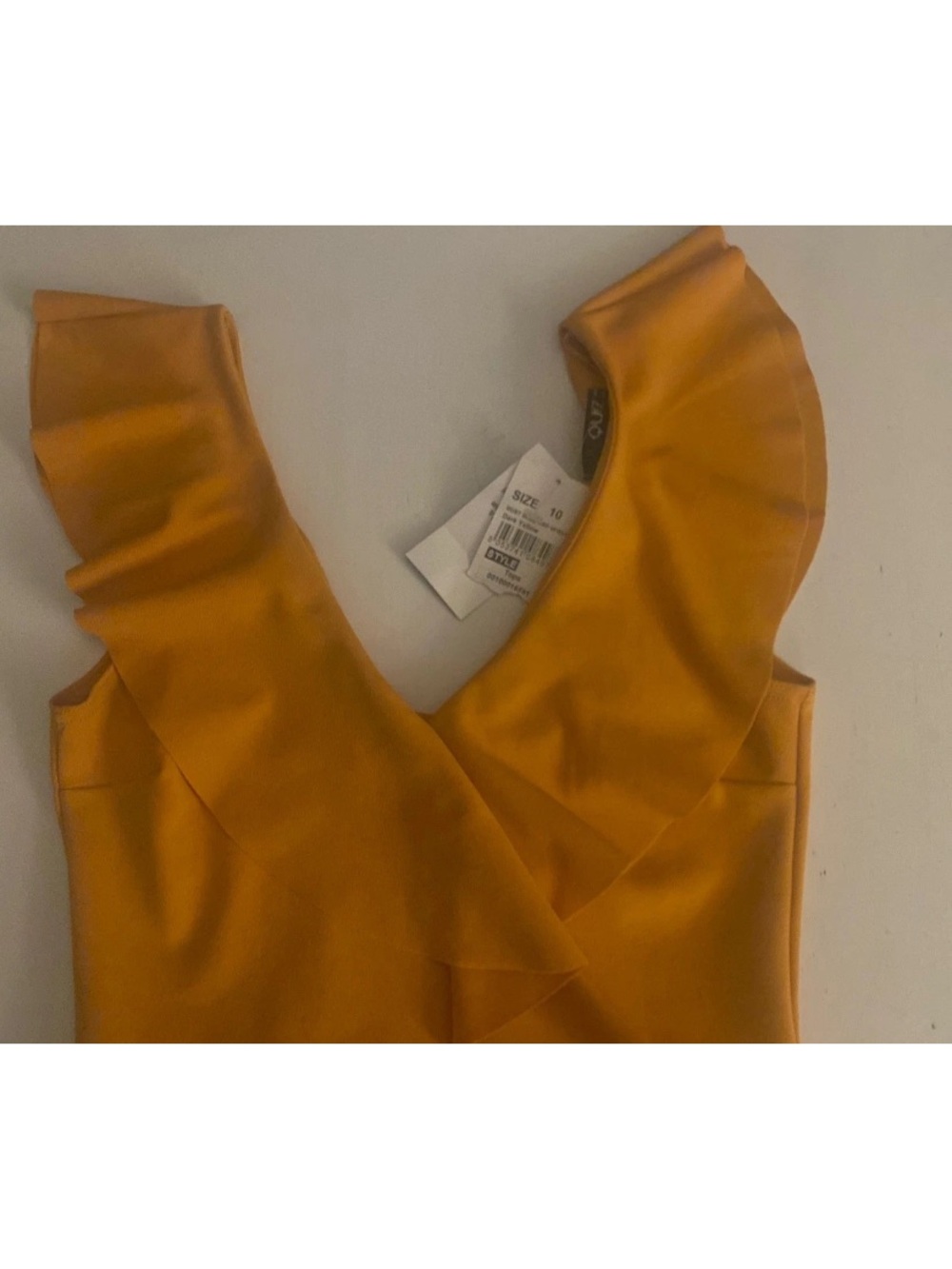 Quiz Brand made in the UK- Sleeveless, Ruffled VNeck bodysuit Size 10 NWT
